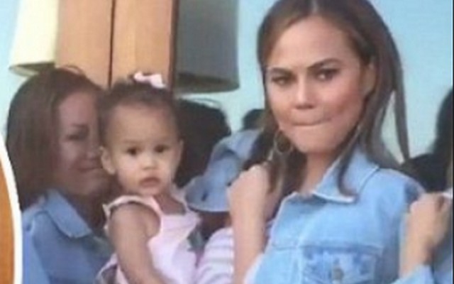 model-chrissy-teigen-captured-with-an-entire-cleavage-hanging-out