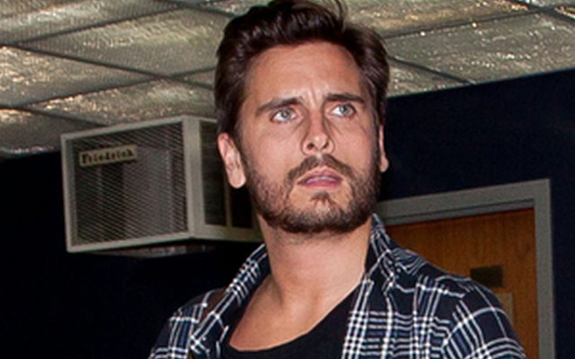 scott-disick-hangs-out-with-topless-woman